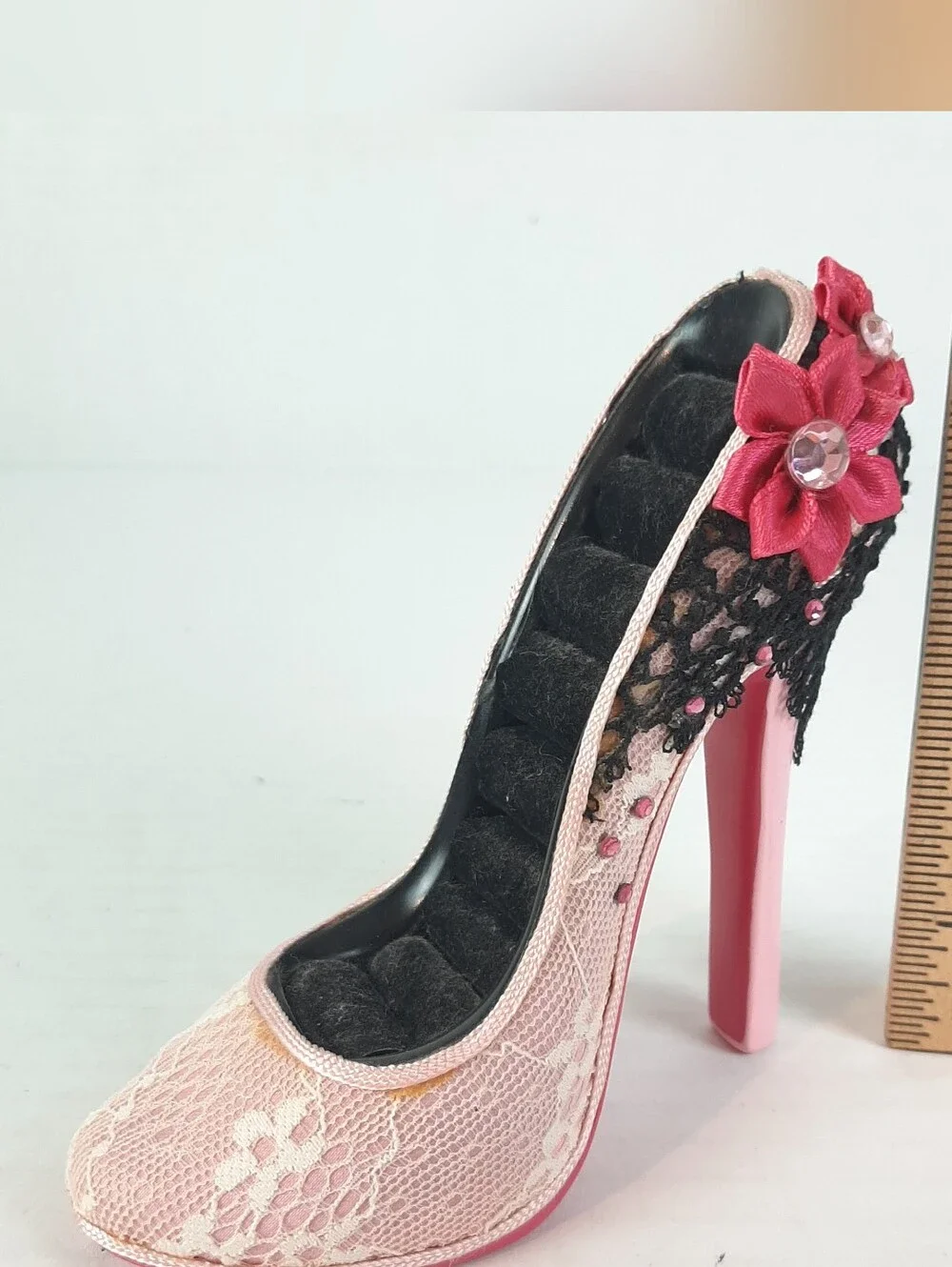 Pink with black and white lace detail high heel jewelry display